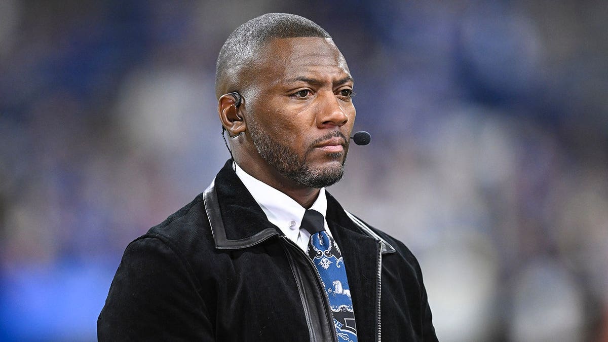 Ryan Clark looks on at Lucas Oil Stadium.