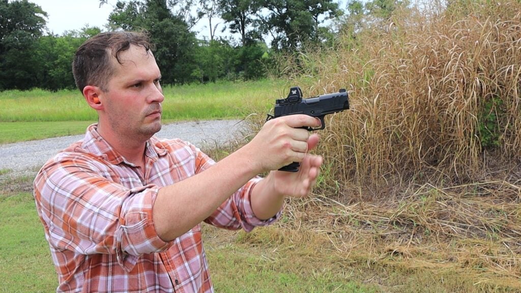Jim prepares to shoot the Springfield Prodigy 3.5 inch pistol
