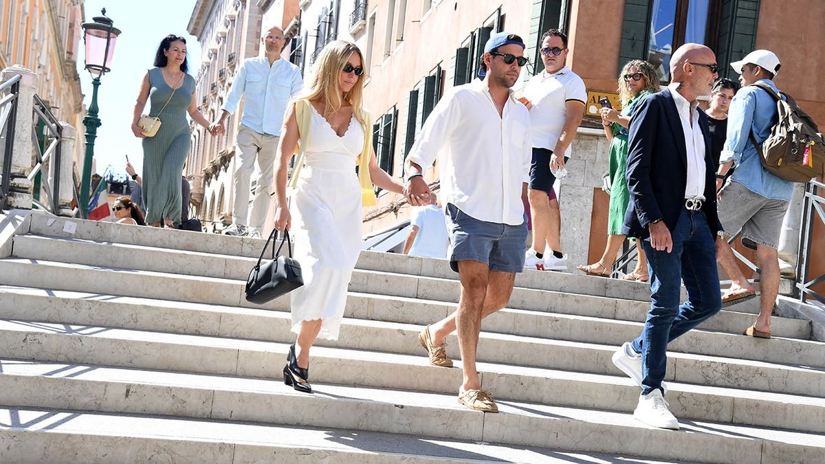 Scooter Braun and Sydney Sweeney walking around in Venice, Italy in September 2026.