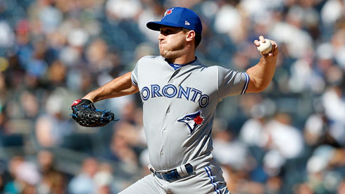 Thomas Pannone #45 pitches for the Toronto Blue Jays against the New York Yankees at Yankee Stadium.