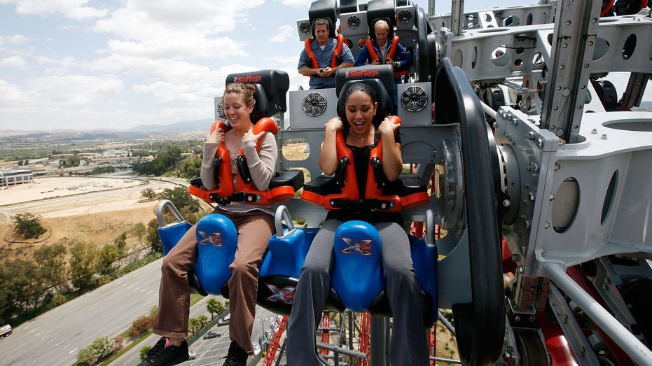 The first riders of the newly debuted X2 ride at Six Flags Magic Mountain