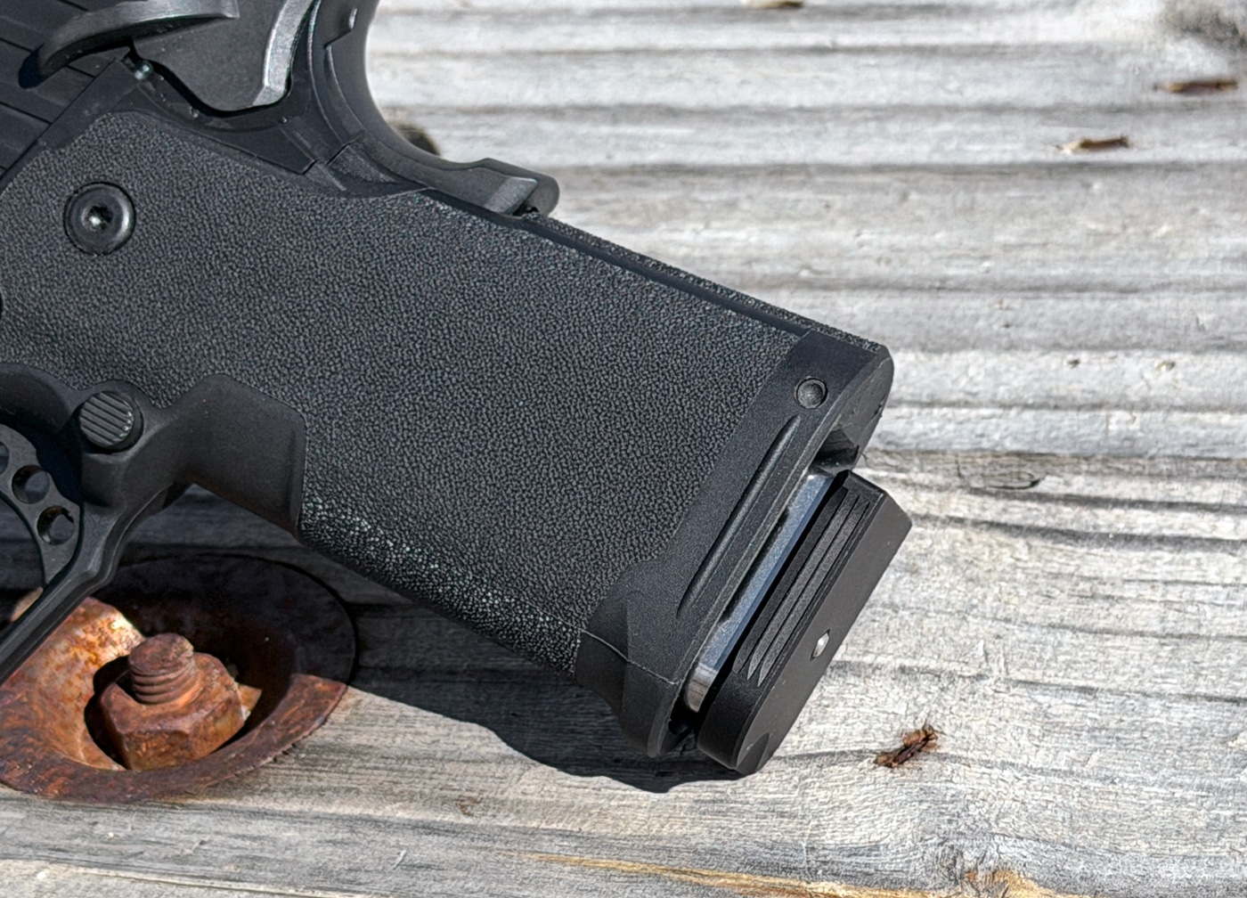Check-Mate UHC magazine sits at the same spacing as the stock 126mm magazines