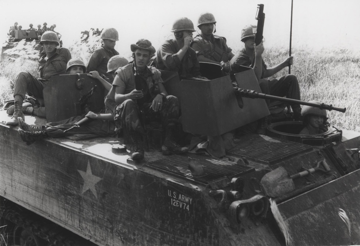 US Marines ride on top of M113 during the Vietnam War