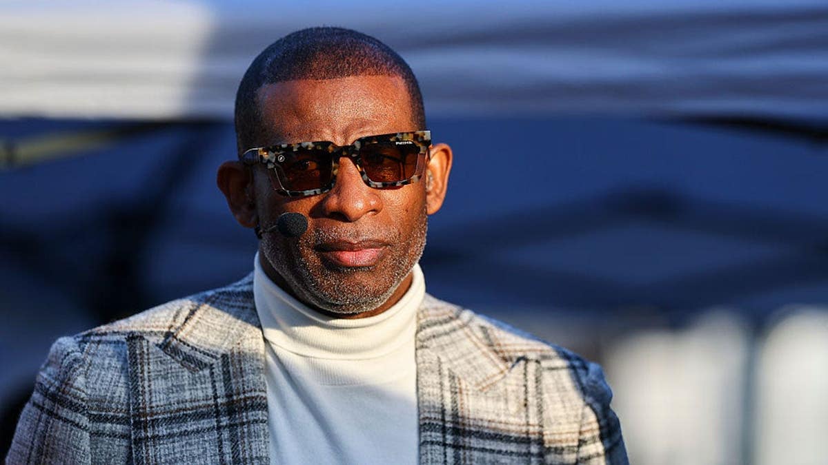 Deion Sanders stands near the set of First Take in San Francisco.