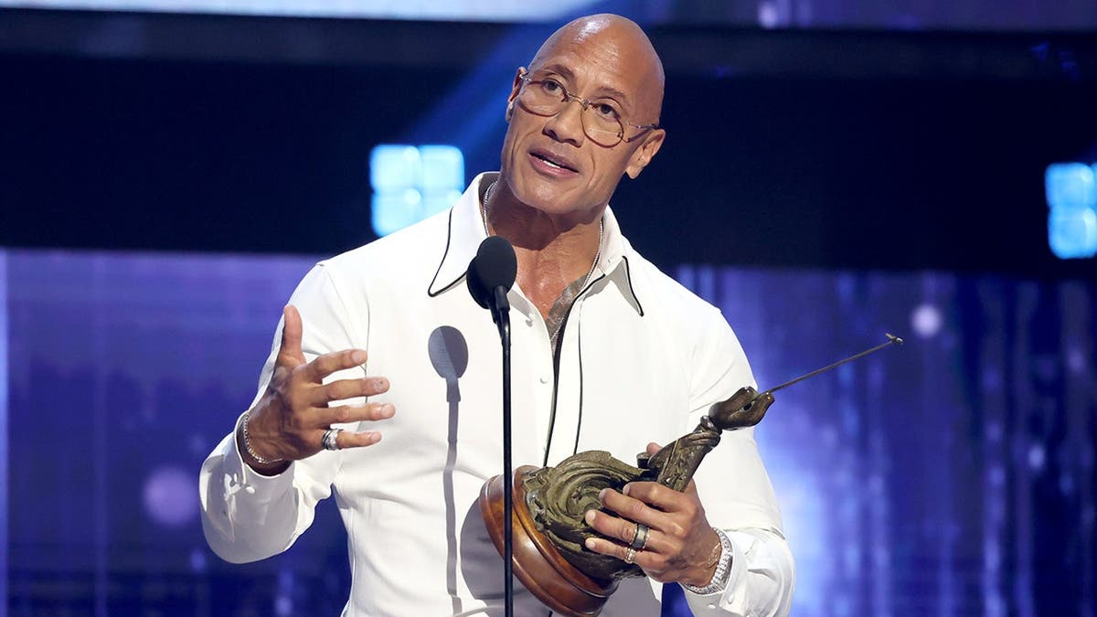 Dwayne Johnson speaks onstage at Disney Entertainment Showcase in Anaheim, Calif.