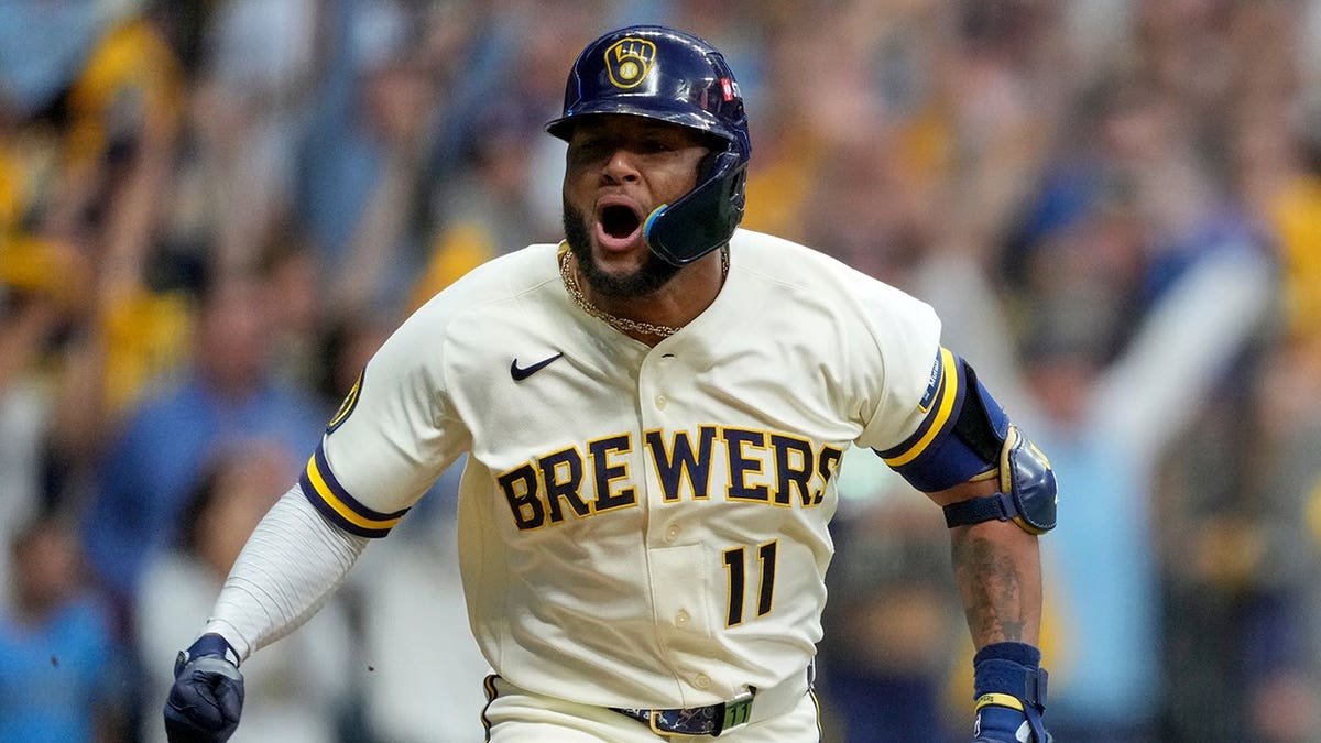 Jackson Chourio celebrates after hitting a walkoff hit during the ninth inning.