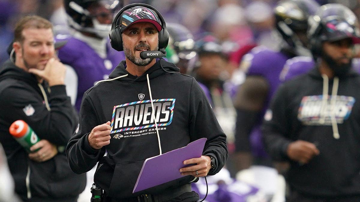 Jesse Minter reacts on the sideline during a Ravens-Titans game at M&T Bank Stadium.