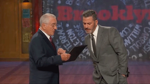 Robert De Niro jokingly prods Jimmy Kimmel with a baseball bat while posing as FCC chair, threatens host
