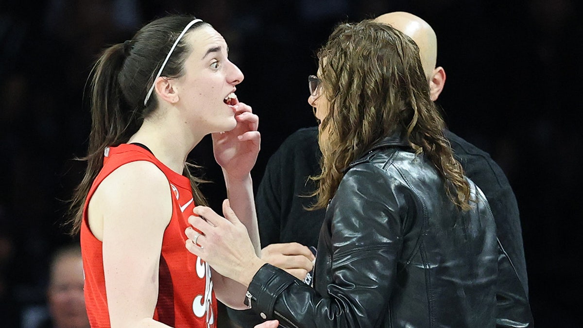 Stephanie White checks out Caitlin Clark